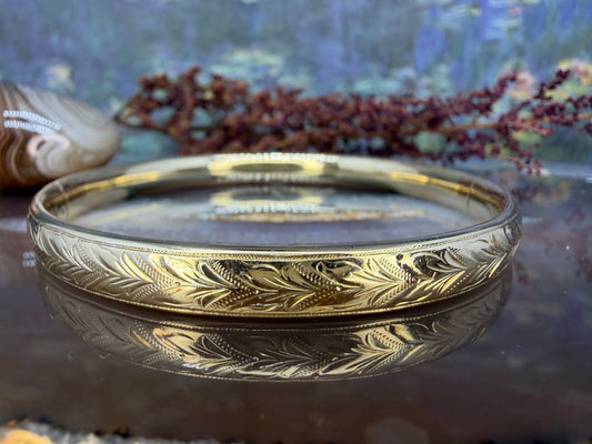 14 karaat gouden bewerkte bangle
