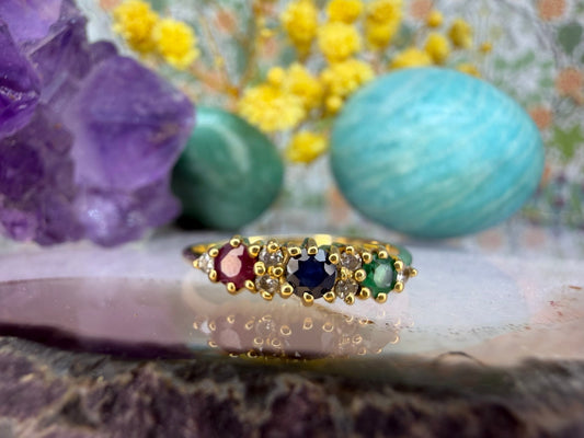 18 karaat gouden ring met edelstenen en diamant