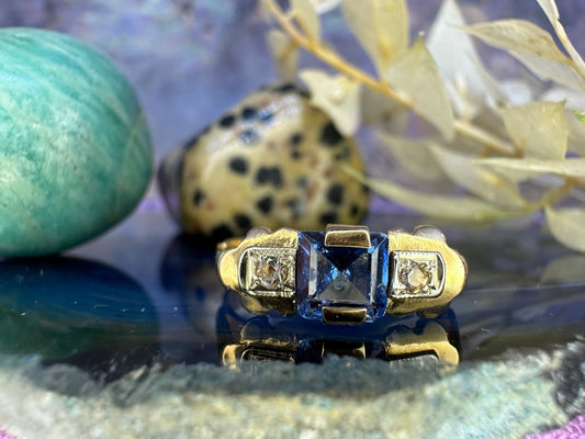 18 karaat gouden ring met topaas en spinel