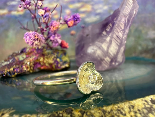 Zilveren ring met zirkonia in bloem