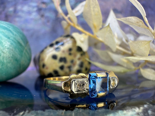 18 karaat gouden ring met topaas en spinel