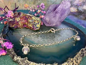 Zilveren kinderarmbandje met bedels Zilveren kinderarmbandje met bedels