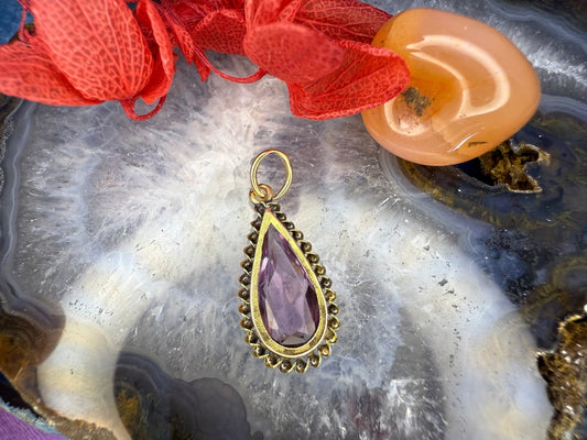 14 karaat gouden hanger met paarse steen