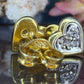 14 karaat hartjes oorknoppen met diamantjes