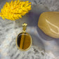 14 karaat gouden tijgeroog hanger
