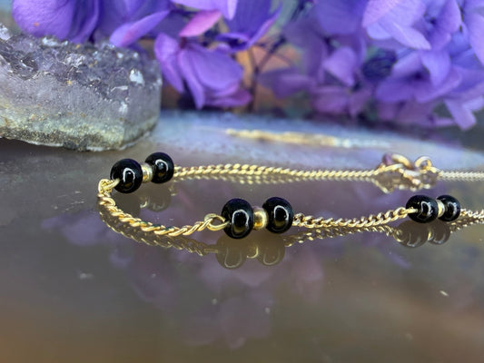 14 karaat gouden onyx armband