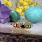 18 karaat gouden ring met edelstenen en diamant