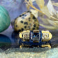 18 karaat gouden ring met topaas en spinel