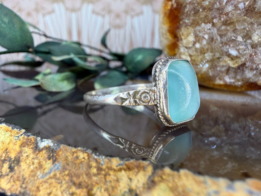 Zilveren ring met melkglas