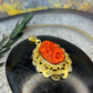 14 karaat gouden hanger met bloedkoraal