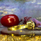 18 karaat gouden ring met granaat en parels