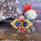 14 karaat gouden ring met saffier en toermalijn