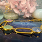 18 karaat gouden armband met pastelkleurige stenen