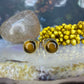 18 karaat gouden oorknoppen met tijgeroog