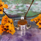 Zilveren hanger met oranje edelsteen