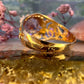 14 karaat gouden ring met korund en enamel