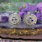 Vintage oorbellen met Chanel logo