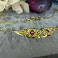 14 karaat gouden robijn en diamant ketting