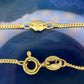 18 karaat gouden armband met klavertjes vier