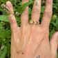 18 karaat gouden gevlochten ring