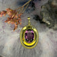 8 karaat hanger met paarse steen