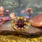 14 karaat gouden ring met korund en enamel