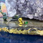 14 karaat gouden piercing met groene granaat