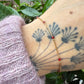 18 karaat gouden armband met rode steentjes