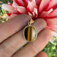 14 karaat gouden tijgeroog hanger