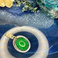Zilveren hanger met groene steen