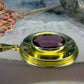 8 karaat hanger met paarse steen