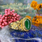 14 karaat gouden ring met groene steen