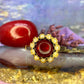 18 karaat gouden ring met granaat en parels