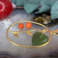 18 karaat gouden hanger met jade en bloedkoraal