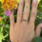 18 karaat gouden ring met edelstenen en diamant