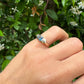 18 karaat gouden ring met topaas en spinel