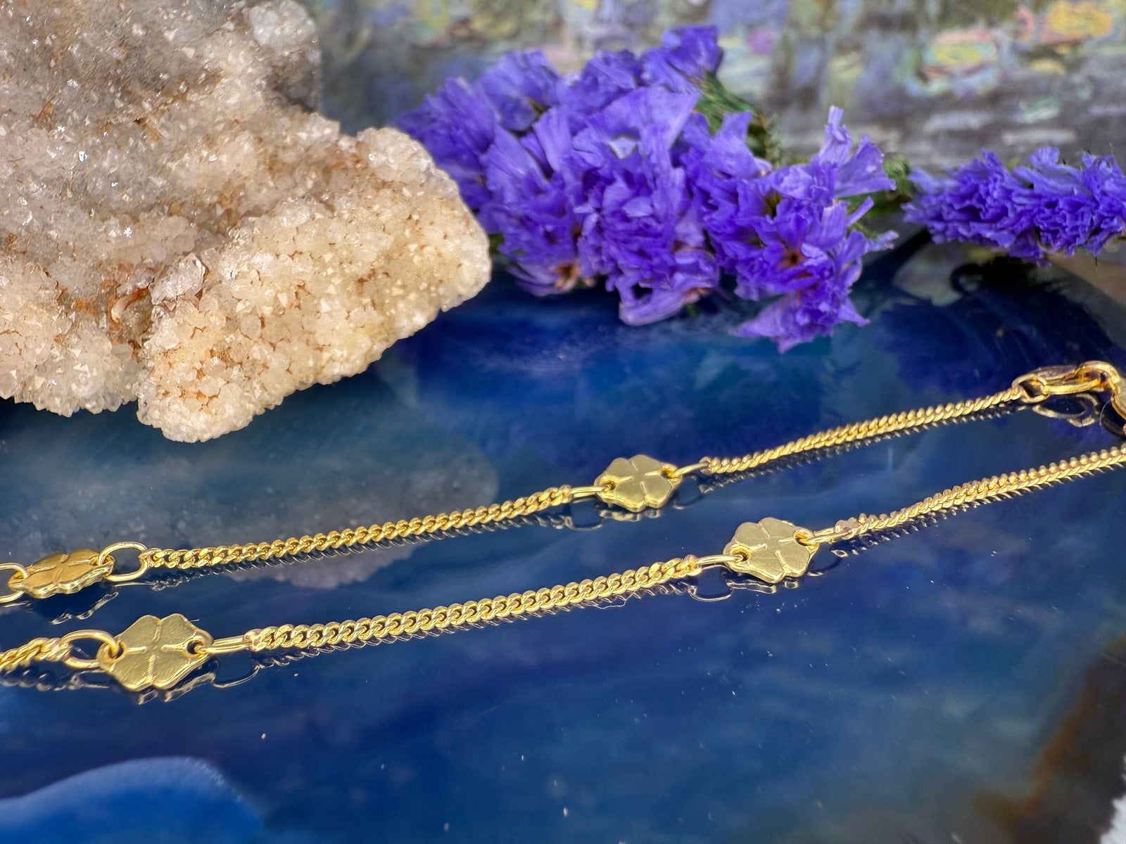 18 karaat gouden armband met klavertjes vier