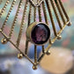 14 karaat gouden hanger met paars steentje