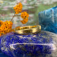 18 karaat gouden pinkring met saffier
