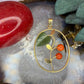 18 karaat gouden hanger met jade en bloedkoraal
