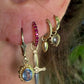 14 karaat gouden spinel oorbellen