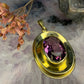 8 karaat hanger met paarse steen