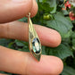 14 karaat gouden hanger met groene spinel