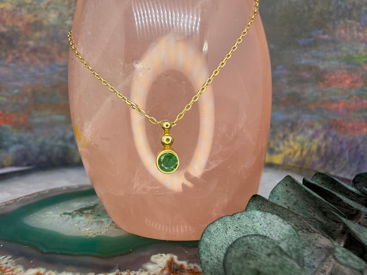 14 karaat gouden smaragd ketting