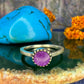 Zilveren ring met paars steentje