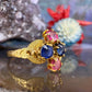 14 karaat gouden ring met saffier en toermalijn