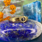 18 karaat gouden pinkring met saffier