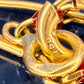 18 karaat gouden armband met rode steentjes