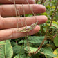 14 karaat gouden robijn en diamant ketting