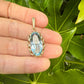 14 karaat gouden hanger met blauwe steen